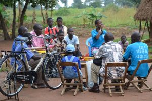 DLU donats a bicycle to Deaf Farmer
