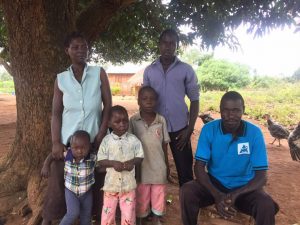 Olupot with his deaf wife and their children.